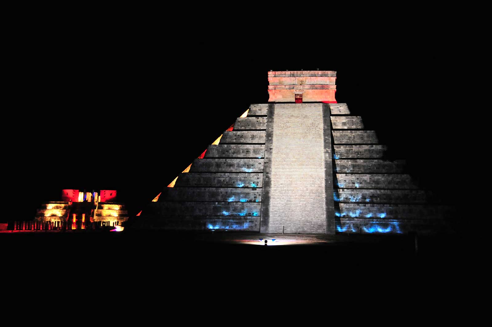 Pyramid of Chichen Itza at night during the light and sound show